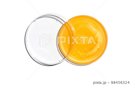 Shower cream in petri dish with plastic lid on white laboratory table. Chemical ingredient for cosmetics and toiletries product. Top View Shower cream in petri dish with plastic lid on white laboratory table. Chemical ingredient for cosmetics and toiletries product. Top View 98456324