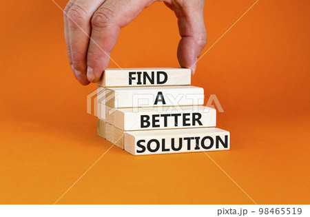 Find a better solution symbol. Concept words Find a better solution on wooden blocks. Beautiful orange table orange background. Businessman hand. Business find a better solution concept. Copy space. Find a better solution symbol. Concept words Find a better solution on wooden blocks. Beautiful orange table orange background. Businessman hand. Business find a better solution concept. Copy space. 98465519