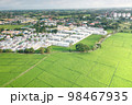 Land and housing estate in aerial view. 98467935