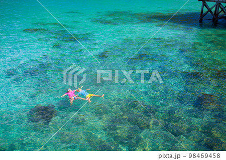 Kids snorkel. Children snorkeling in tropical sea. Kids snorkel. Children snorkeling in tropical sea. 98469458