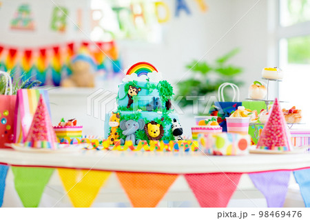 Kids birthday cake. Child jungle theme party. 98469476
