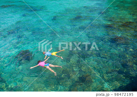 Kids snorkel. Children snorkeling in tropical sea. Kids snorkel. Children snorkeling in tropical sea. 98472195