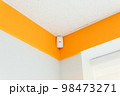Combined motion or glass break sensor detector for security system mounted on wall in a hospital or house.  98473271