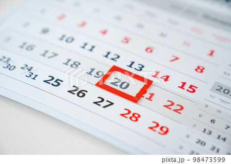 the red tab on the flip calendar page. the red tab on the flip calendar page. 98473599