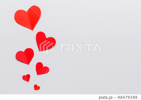 Valentine day background with red hearts, top view with copy space Valentine day background with red hearts, top view with copy space 98479398