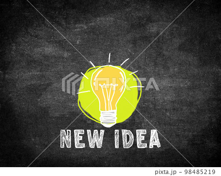 New idea and light bulb handwriting on blackboard. 98485219