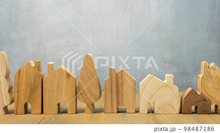 The wood home for building or property concept. The wood home for building or property concept. 98487186