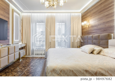 Luxury bedroom interior with parquet and wood marble walls 98497682