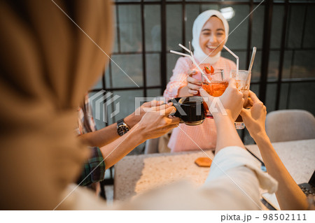 some people bring glasses of toast when they get together 98502111