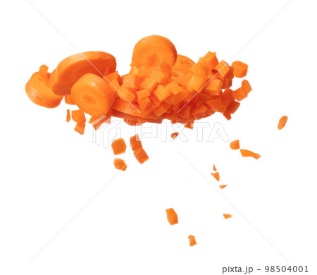 Carrot fresh fly float in Air turn to Cube dice and round slice shape. Beta Carotene orange color in Carrot is good health. Many Dice cube carrot flying throw up in Air. White background isolated 98504001