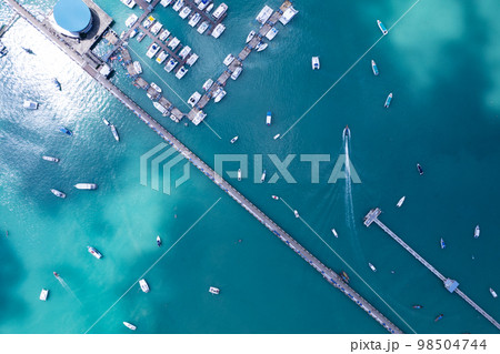 Aerial View Top down Drone shot of Yacht and sailboat parking in marina Transportation and travel background Beautiful sea in summer season 98504744