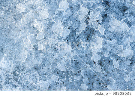 Fragments of thin ice, frozen river surface, macro photo 98508035