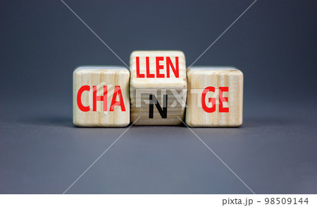 Challenge and change symbol. Concept word Challenge Change on wooden cubes. Beautiful grey table grey background. Business and challenge and change concept. Copy space. 98509144