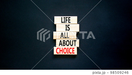 Choice and life symbol. Concept words Life is all about choice on wooden blocks. Beautiful black table black background. Business choice and life concept. Copy space. Choice and life symbol. Concept words Life is all about choice on wooden blocks. Beautiful black table black background. Business choice and life concept. Copy space. 98509246