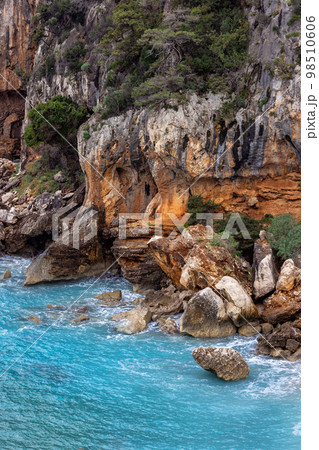 Rocky coast near Cala Gonone, Sardinia. Nature Background Rocky coast near Cala Gonone, Sardinia. Nature Background 98510606