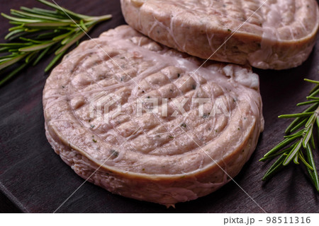 Raw meat balls with spices and herbs or crepinette Raw meat balls with spices and herbs or crepinette 98511316