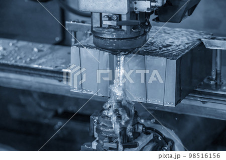Closeup scene the wire EDM machine cutting the mold insert parts. 98516156