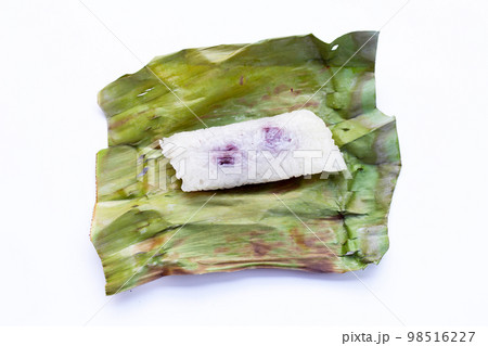 Grilled sticky rice in banana leaves with taro filling 98516227