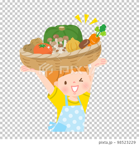 A boy carrying vegetables in a basket 98523229