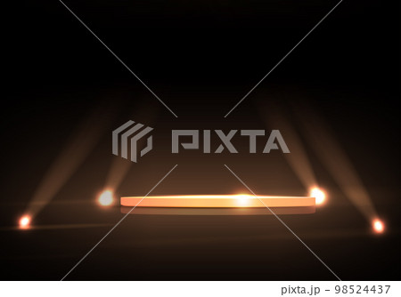 Round podium, spotlights with a bright glow on a dark background 98524437