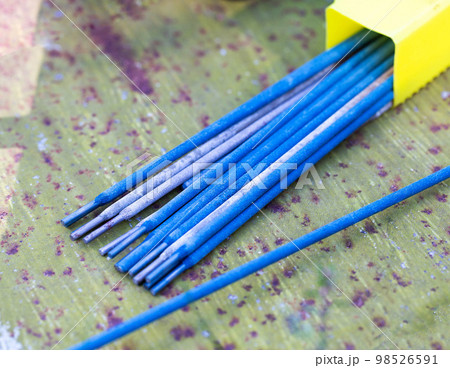 A set of electrodes for manual welding, seam and resistance welding of surfaces. Close-up 98526591