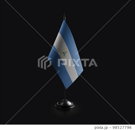 Small national flag of the Nicaragua on a black background Small national flag of the Nicaragua on a black background 98527796