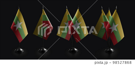Small national flags of the Myanmar on a black background 98527868
