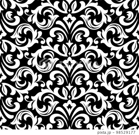 Wallpaper in the style of Baroque. Seamless vector background. White and black floral ornament. Graphic pattern for fabric, wallpaper, packaging. Ornate Damask flower ornament 98529177