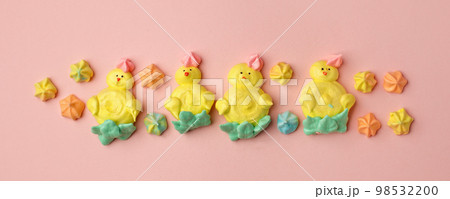 Colorful easter Sweet cookies, meringue on pink background, colorful seasonal holiday concept, stylish greeting card, invitation, flyer. Delicious traditional snack cookies for kids, copy space banner Colorful easter Sweet cookies, meringue on pink background, colorful seasonal holiday concept, stylish greeting card, invitation, flyer. Delicious traditional snack cookies for kids, copy space banner 98532200