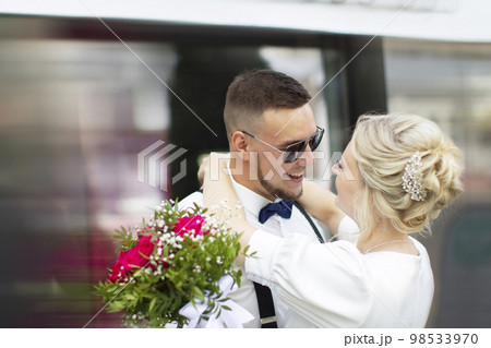 Couple in love man and woman, bride and groom hug close-up. 98533970