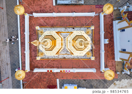 Wat Phra That Doi Tung from above birdeyes view, a famous Temple and Buddhism place. It's settled on the mountain in Chiang Rai province, north of Thailand. 98534765