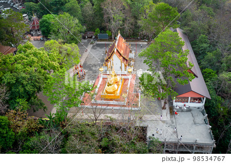Wat Phra That Doi Tung from above birdeyes view, a famous Temple and Buddhism place. It's settled on the mountain in Chiang Rai province, north of Thailand. 98534767
