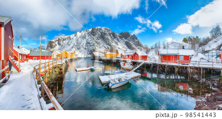 Awesome morning seascape of Norwegian sea and cityscape of Nusfjord village. 98541443
