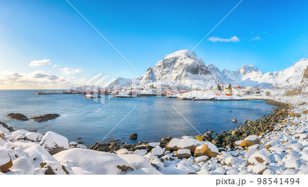 Breathtaking winter scenery of A village. Norwegian fishing village, with the typical rorbu houses . 98541494