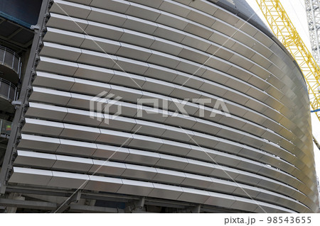 Santiago Bernabeu. Exterior of the Santiago Bernabeu stadium in full works and renovation of the venue where Real Madrid C.F. Football field. Field full of machines. MADRID, SPAIN - JANUARY 24, 2023. Santiago Bernabeu. Exterior of the Santiago Bernabeu stadium in full works and renovation of the venue where Real Madrid C.F. Football field. Field full of machines. MADRID, SPAIN - JANUARY 24, 2023. 98543655