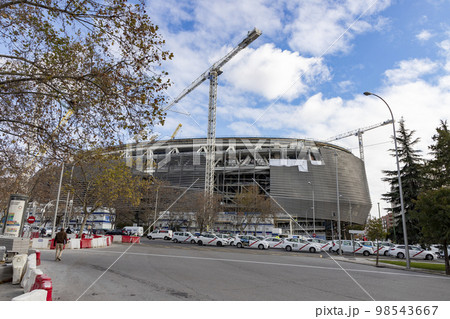 Santiago Bernabeu. Exterior of the Santiago Bernabeu stadium in full works and renovation of the venue where Real Madrid C.F. Football field. Field full of machines. MADRID, SPAIN - JANUARY 24, 2023. Santiago Bernabeu. Exterior of the Santiago Bernabeu stadium in full works and renovation of the venue where Real Madrid C.F. Football field. Field full of machines. MADRID, SPAIN - JANUARY 24, 2023. 98543667