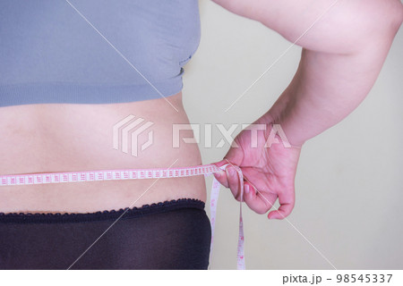 Fat woman, Shape up healthy stomach muscle, and diet lifestyle Fat woman, Shape up healthy stomach muscle, and diet lifestyle 98545337