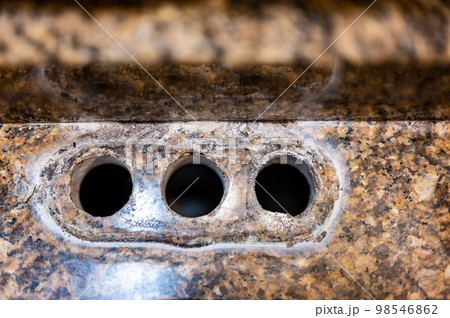 Replacing a bathroom sink faucet with a new assembly. Replacing a bathroom sink faucet with a new assembly. 98546862