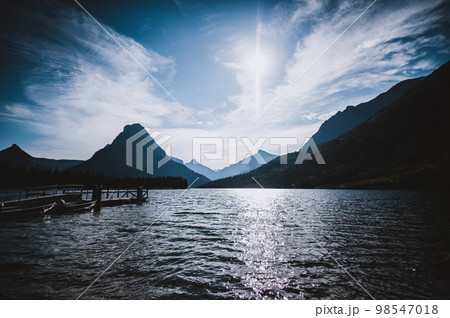 Shoreline view of Two Medicine lake as the sun goes down at Glacier National Park, Montana 98547018