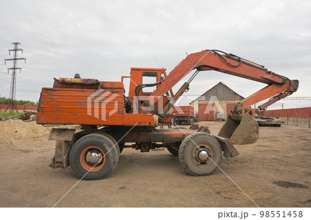 Red Heavy Power Bulldozer work on a building site Red Heavy Power Bulldozer work on a building site 98551458