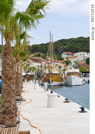 Elegant sailing boat in marina, Yachts and boats docked on pier in yacht in marina. Croatia Elegant sailing boat in marina, Yachts and boats docked on pier in yacht in marina. Croatia 98553638