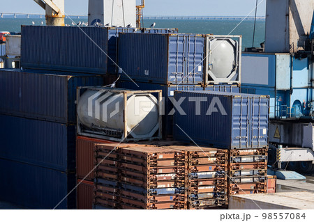 A lot of containers ready for shipping in the port A lot of containers ready for shipping in the port 98557084