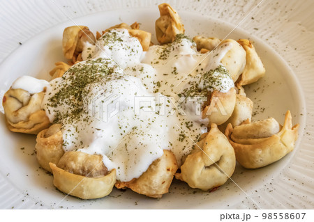 Manti is one favorite Turkish traditional dishes. Manti is very popular and common with or without yogurt in Turkey. 98558607