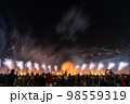 Crowd watching fireworks and celebrating new year eve 98559319