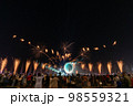 Crowd watching fireworks and celebrating new year eve 98559321