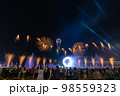 Crowd watching fireworks and celebrating new year eve 98559323