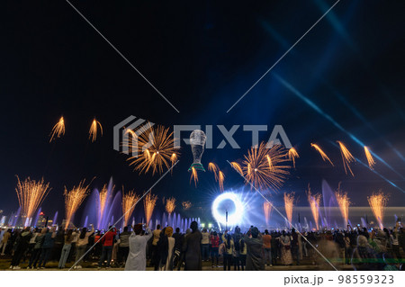 Crowd watching fireworks and celebrating new year eve 98559323