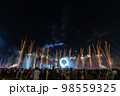 Crowd watching fireworks and celebrating new year eve 98559325
