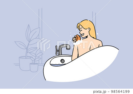 Smiling woman enjoy hot bathtub  98564199