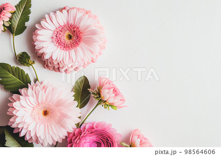 Beautiful pink flowers on white wooden background, Valentine's day concept with copy space Beautiful pink flowers on white wooden background, Valentine's day concept with copy space 98564606